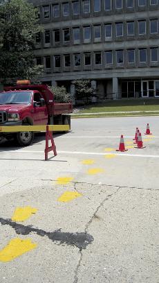 A row of footprints guiding RAGBRAI riders to their various destinations runs through the intersection of Stange and Osborne Monday July 21, 2008. Photo: Andrea Fier/Iowa State Daily