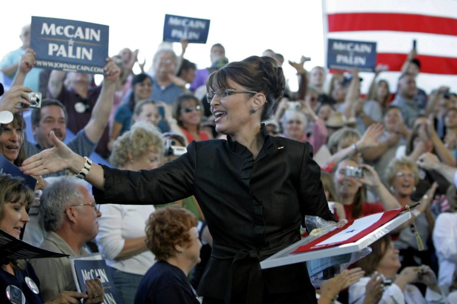Republican vice presidential candidate, Alaska Gov. Sarah Palin, reaches to shake hands at a campaign rally in Carson City, Nev., Saturday, Sept. 13, 2008. (AP Photo/Eric Risberg)