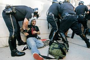 Los Angeles police officers arrest a pair of protesters as hundreds demonstrated against the Mormon Church's support of Proposition 8, the California ballot measure that banned gay marriages, in the Westwood district of Los Angeles Thursday, Nov. 6, 2008. (AP Photo/Reed Saxon)