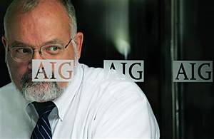 In this Sept. 16, 2008 file photo, a man leaves an American International Group office building in New York. American International Group Inc., once the worlds largest insurer, said Monday, Nov. 10, 2008,A that continued financial market turmoil resulted in a large third-quarter loss. AP Photo/Mark Lennihan