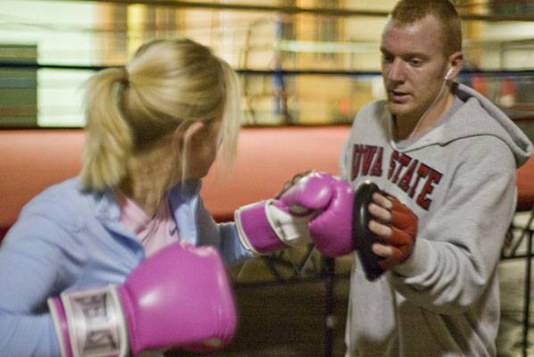 Although Meyers can’t box competitively since his surgery, he still helps out the program by coming to practice and taking on a “coaching adviser” role. Meyers said boxing helped him get his life back on track. Photo: Josh Harrell/Iowa State Daily