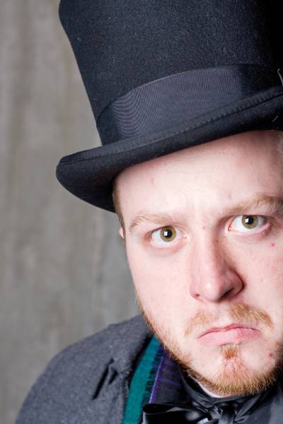 Jeff Mason, junior in performing arts, as Scrooge in 'A Christmas Carol,' a production by Jane Cox. The play will run Dec. 5-7 and 12-14 in Fisher Theater. Photo: Shing Kai Chan/Iowa State Daily