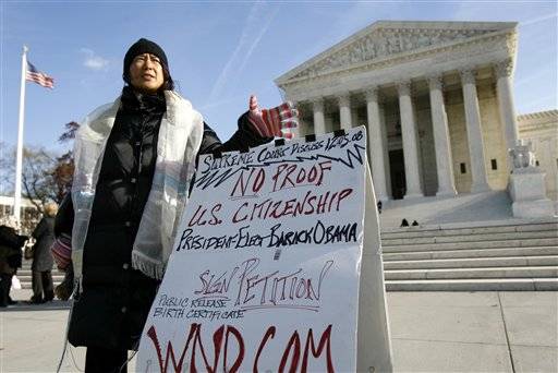 Theresa Cao speaks about President-elect Barack Obama's proof of U.S. citizenship outside the Supreme Court in Washington, Friday Dec. 5, 2008. (AP Photo/Jose Luis Magana)