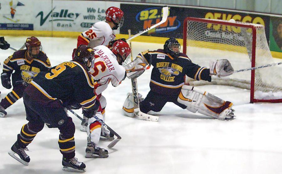 Iowa States junior forward Pete Majkozak, 16, fires a shot during the game against Robert Morris College on Jan, 24 at the Ames/ISU Ice Arena. The shot was caught by the RMC goaltender. The Cyclones won the game 7-2. Photo: Kevin Zenz/Iowa State Daily