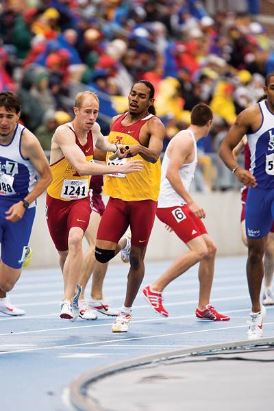 Iowa State’s Derron Montgomery hands off the baton to Ryan Williams, during the men’s sprint medley during the Drake Relays on Saturday at the Drake Stadium in Des Moines. Photo: Josh Harrell/Iowa State Daily