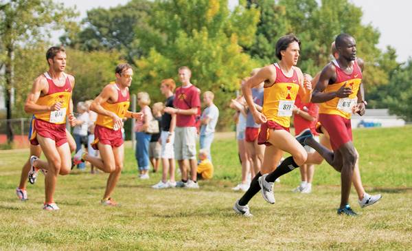 Iowa State cross country runners (from left to right) Daniel Murray, Daniel Fadgen, Josh Mellman and Elphas Sang round a corner during the Iowa Intercollegiate meet held last Saturday at the ISU Cross Country course. Photo: Manfred Brugger/Iowa State Daily