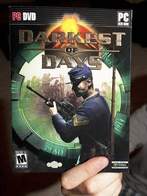 Jeff Russell, lead designer at 8Monkey Labs holds his new game, Darkest of Days, which came out on Sept. 8, 2009. Photo: Laurel Scott/Iowa State Daily