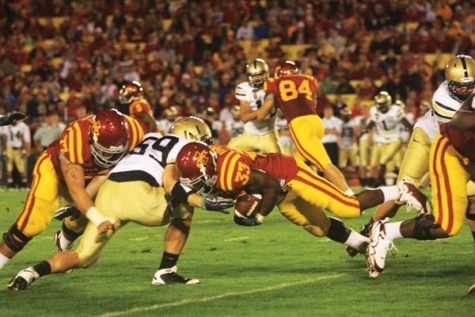 Robinson, 33, dives for more yardage against Army on Saturday. Robinson rushed for 132 yards and one touchdown. Photo: David Livingston/Iowa State Daily 