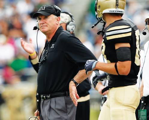 Army head coach Rich Ellerson stands on the sidelines during the second quarter of an NCAA college football game against Duke in West Point, N.Y., Saturday, Sept. 12, 2009. Duke won, 35-19. (AP Photo/Mike Groll)