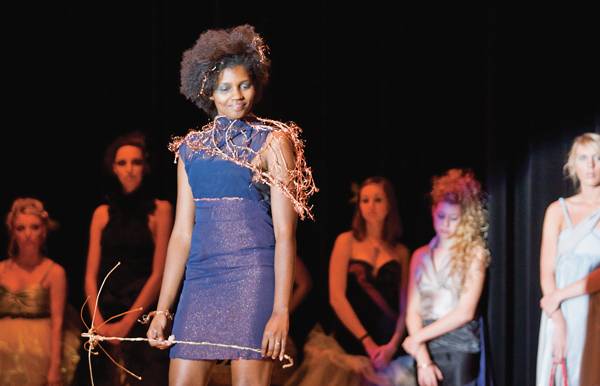 Team Stichery Doo displays their outfit during the ISU Project Runway on Tuesday, September 16, 2008 in the Great Hall in the MU. The team attempted to portray the look of being struck by lightening. Photo: Angela Hettinger/Iowa State Daily