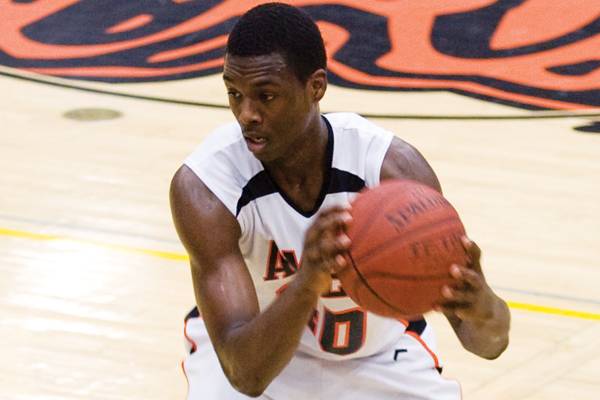 Harrison Barnes, former Ames High prep star, looks to pass Dec 7, 2009 against Des Moines Roosevelt.