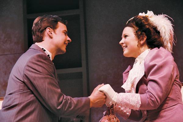 Caleb Woodley, senior in performing arts, rehearses with a fellow cast member for the ISU production of “The Importance of Being Earnest.” Woodley is performing as the character Jack Worthing, a man who wants to marry a woman, but can’t without her mother’s approval. Photo: Jessica Opoien/Iowa State Daily