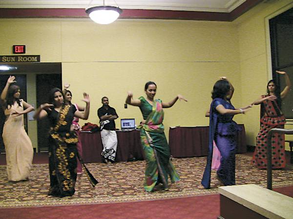 Members of the Sri Lankan Association pose for a picture in their traditional dance dress. The group will present a Rangana Thaala dance event Sunday in the Great Hall of the Memorial Union. Courtesy photo: Sri Lankan Association