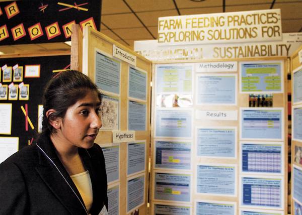 Pearl Sawhney, a sophomore at Maharishi School in Fairfield, talks about how different types of animal feed affect the environment. The Iowa High School Science Fair took place Friday and Saturday for Iowa high school students to show the different experiments they’ve done in various science categories. 