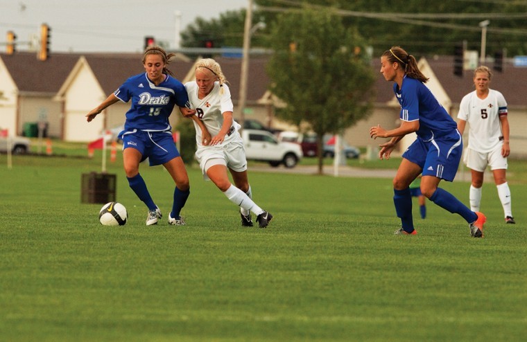 Midfielder Erin Green fights to get the ball from her opponent on Aug. 20 in the Cyclones game against Drake.