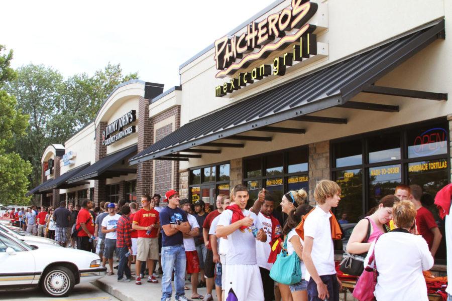 Ames+students+and+residents+endure+long+lines+on+Tuesday%2C+Aug.+24+at+Pancheros+Mexican+Grill%2C+to+see+if+they+could+beat+the+Hawkeyes.+This+%241+burrito+competition+resulted+in+an+Ames+lost+with+only+1%2C008+burritos+sold%2C+compared+to+Iowas+1%2C344.