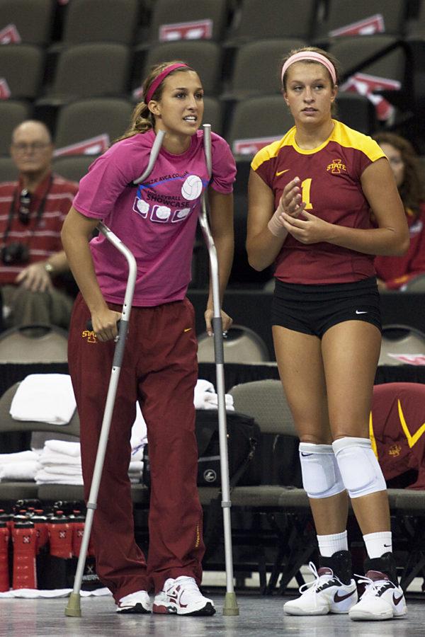 Outside hitter Rachel Hockaday stands on the sideline during Sunday’s game. Hockaday injured her knee during the match Saturday and might miss the entire season. The injury is believed to be an ACL tear.