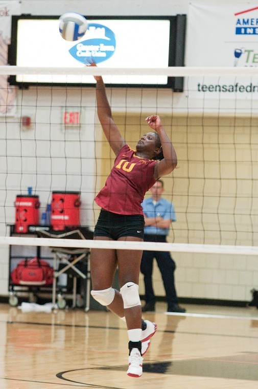 Outside hitter Victoria Henson jumps for a hit during the Cardinal and Gold Scrimmage on Saturday, Aug. 21.