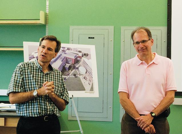 Brent Shanks, professor of chemical and biological engineering, left, and Robert Brown, distinguished professor in mechanical Engineering and director of the Biorenewables Lab, discuss the new building Wednesday. 