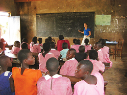 Katie Taylor, senior in agronomy, instructs a class of Ugandan children. Taylor and other Iowa State students who participated in the Uganda Service-Learning Program this past summer taught the Ugandan children everything from math and science, to the importance of agriculture.