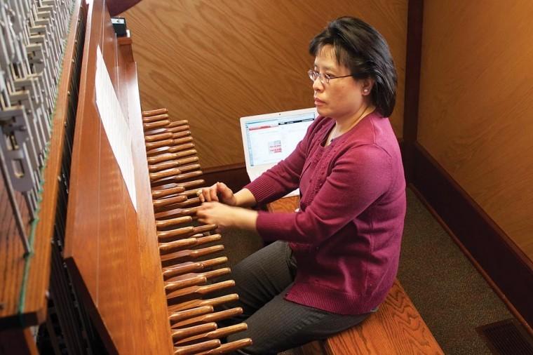 Tin-Shi Tam, university carillonneur, plays the carillon in the Campanile every day. Song requests for popular songs have increased since the YouTube video of her playing Lady Gagas Bad Romance.