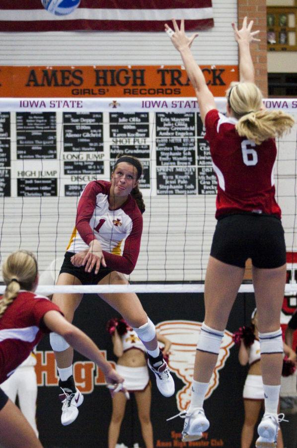 Iowa States Carly Jenson hits the ball to Nebraska during the Cyclones game at Ames High on Wednesday, Sept. 15.  