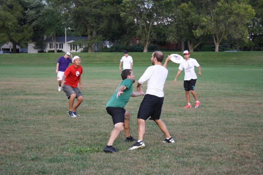 Ultimate participants fight for the disc Wednesday, Sept. 15. The Chad Larson Experience, a team made up of members from around the country including ISU alumni, won the World Ultimate Championships in Prague, Czech Republic this summer.