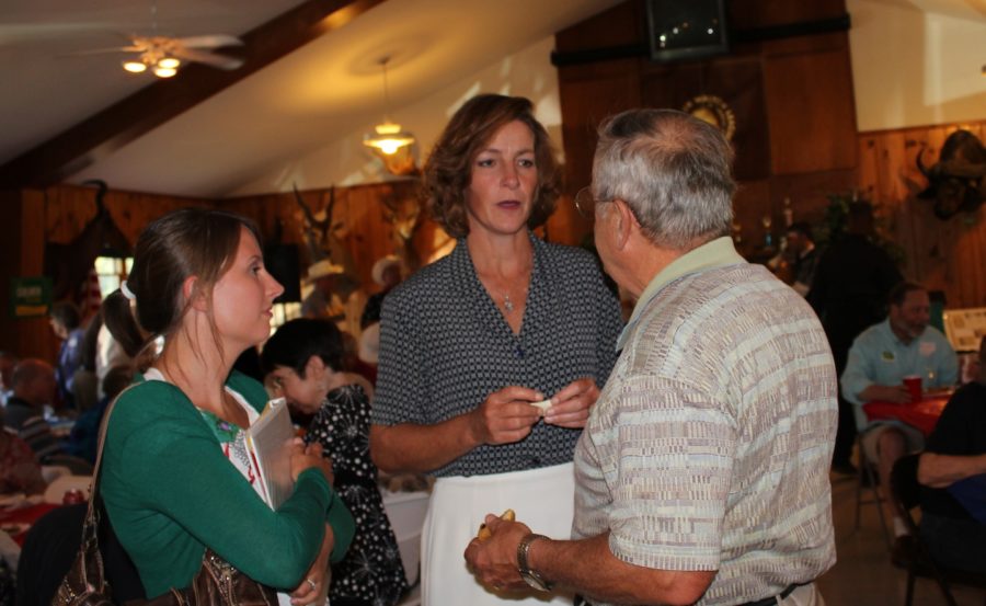 Iowa first lady Mari Culver speaks with guests attending the Story County Democrats barbecue Saturday, Sept. 4.