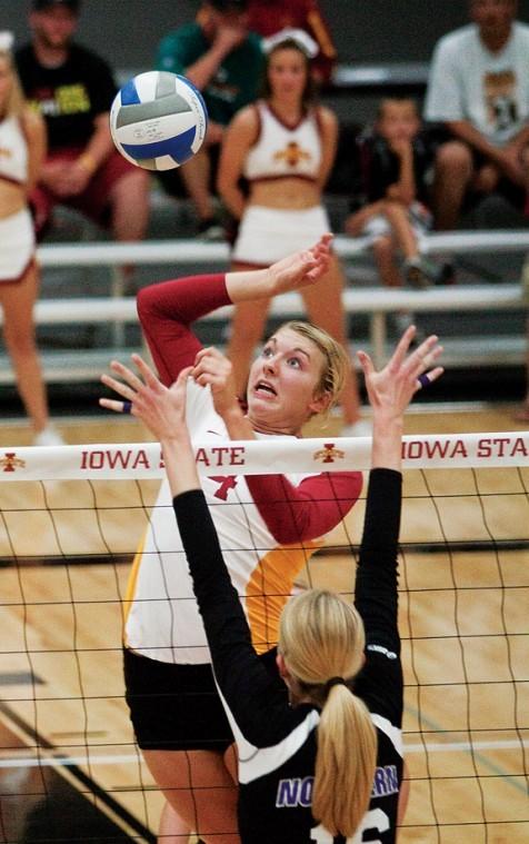 Middle blocker Jamie Straube jumps up for a spike in the game against Northern Iowa on Sept. 8 at Ames High School. Straube had 10 kills and two digs in Saturdays game against Oklahoma to aid in the 3-0 victory over the Sooners.