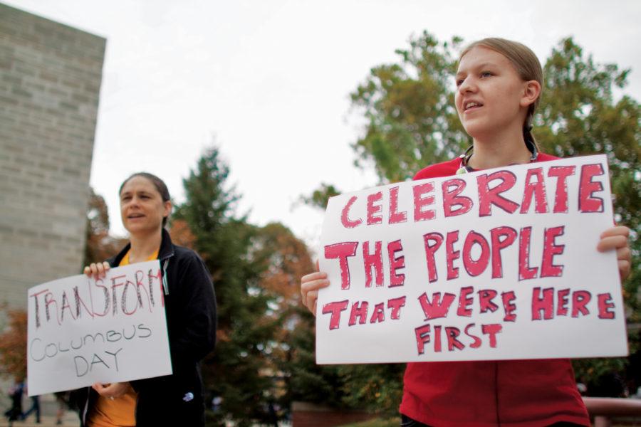 Ariel Jetty, sophomore in animal ecology, takes part in a Columbus Day rally on Monday, Oct. 11 in the free speech zone outside the library. The rally was held to bring attention to what kind of person Christopher Columbus was and what the holiday really represents.