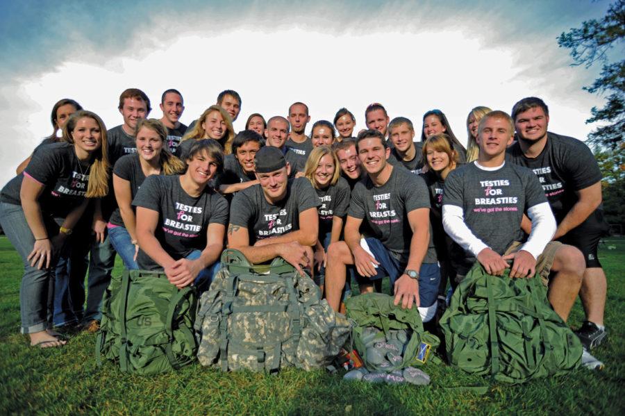 Members of the Testies for Breasties rock crew will haul 100-pound bags of rocks during the Race for the Cure on Saturday.