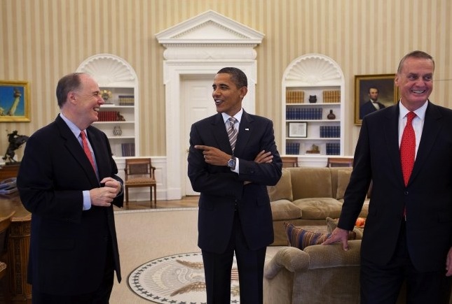 President Barack Obama points to Deputy National Security Adviser Tom Donilon while talking with National Security Adviser Gen. Jim L. Jones, right, in the Oval Office before the announcement that Gen. Jones is stepping down from his post later this month and will be replaced by Donilon on Friday, Oct, 8.