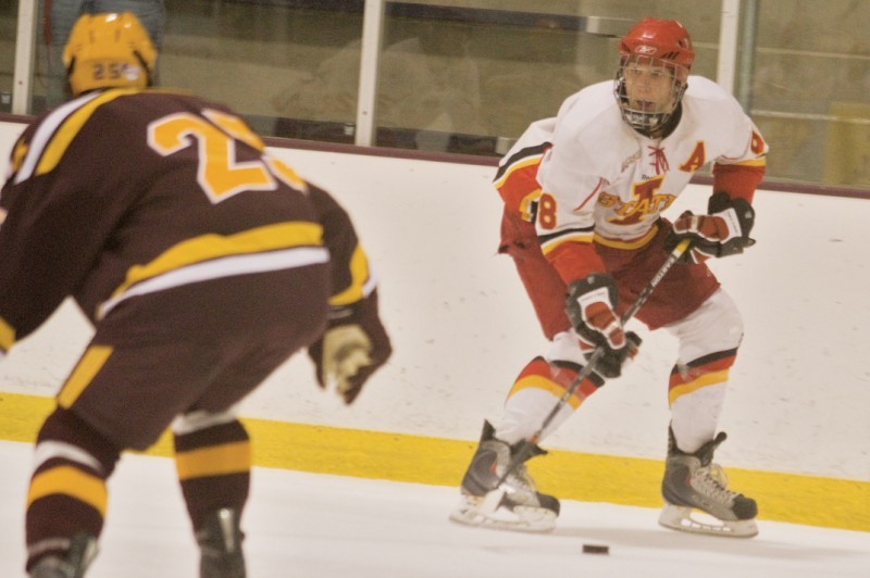 Curt Bulloch eyes his opposition during a game on Friday, Oct. 8, at the Ames/ISU Ice Arena. 