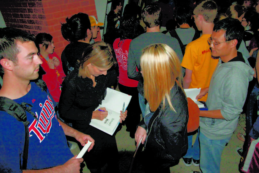 CNN correspondent Christine Roman signs autographs for fans after her lecture on the economy Wednesday,Oct. 6. She also handed out free books to students in ME 484/584. 