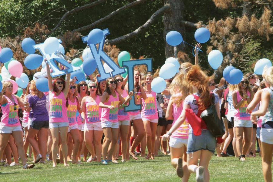 Kappa Kappa Gamma sorority sisters cheer as their new members run toward them on Aug. 19 on Central Campus.
