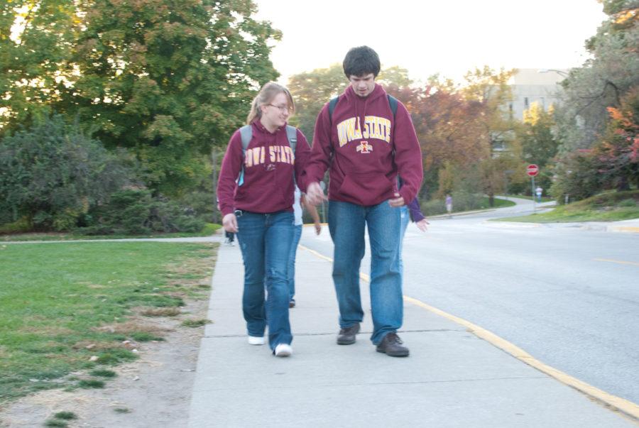 Christa VanT Hul, sophomore in civil engineering and Charles Nino, sophomore in mechanical engineering, walk around campus after class, Thursday, Oct. 7, in front of the Memorial Union. They said that their relationship just became facebook official today. 