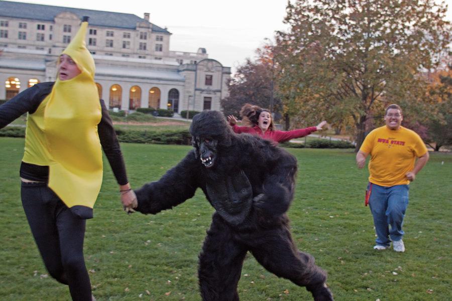 Nate Dobbels and Erin Curtis chase Banana and Gorilla Friday at Central Campus.