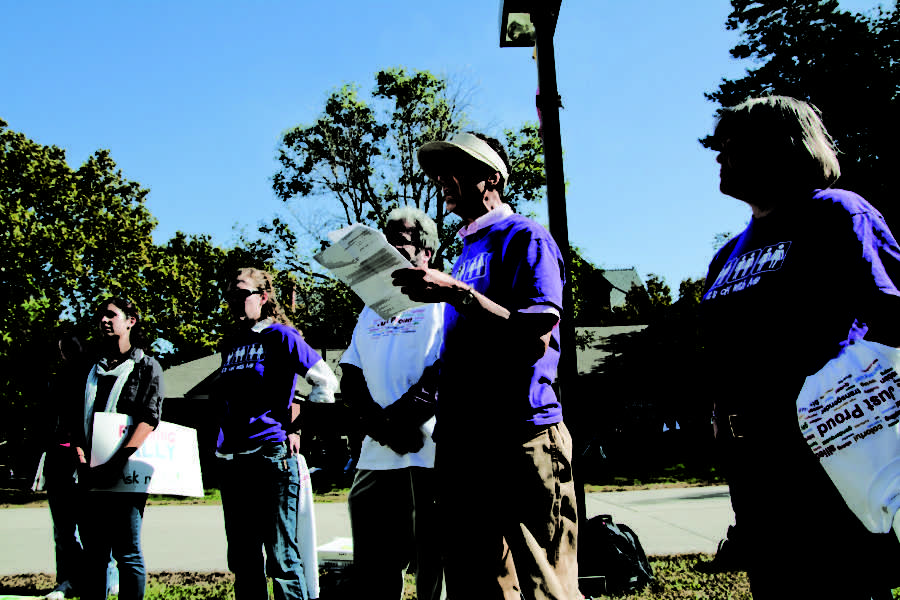 Warren Blumenfeld, associate professor of curriculum and instruction, reads a speech he wrote titled Many Faces of Queer Bashing, to listeners on National Coming Out Day on Friday Oct. 15, in front of Parks Library. He spoke about opening up to people of all backgrounds and ignorance of the gay and lesbian community. 