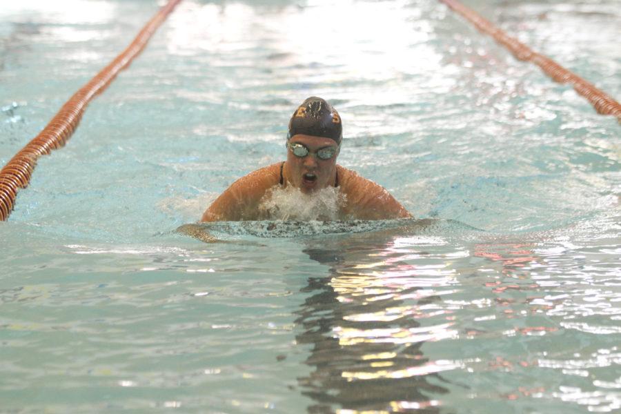 Freshman Emily Wiltsie competes in the 100-yard breaststroke during the swim meet on Saturday, Oct. 30. Wiltsie took first place in the event, and Iowa State beat South Dakota State with an overall score of 152-83, as well as Western Illinois with a score of 161-48.