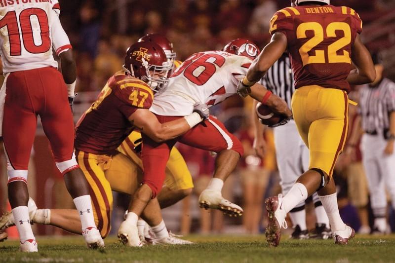 Linebacker A.J. Klein attempts to stop Utah running back Eddie Wide during the game Oct. 11, 2010 at Jack Trice Stadium.
