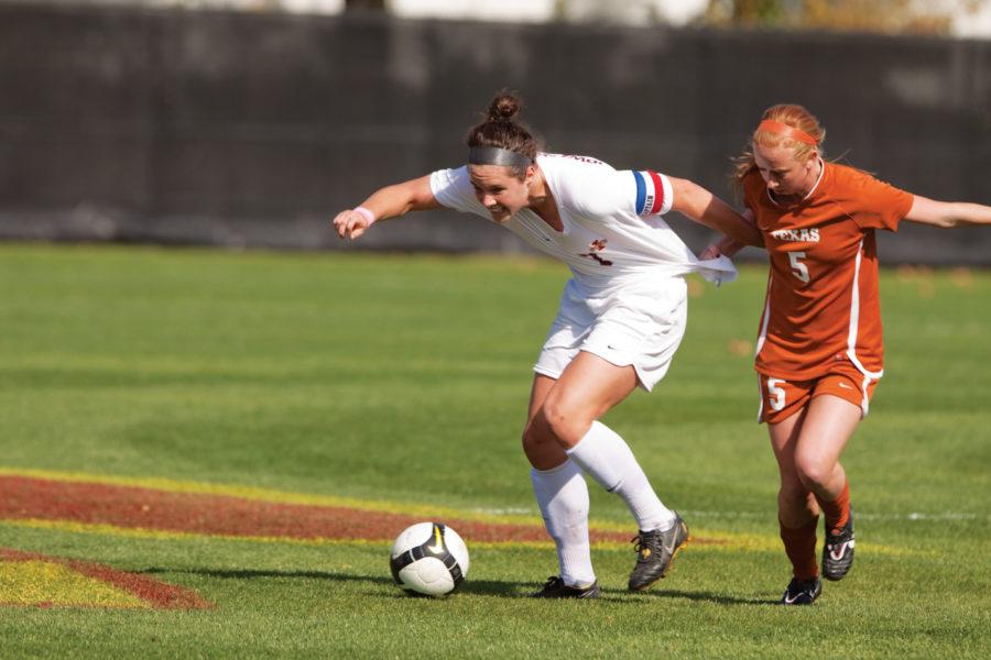 Midfielder and defender Mary Kate McLaughlin fights with Texas forward Hannah Higgins for control of the ball during Sundays game at home. McLaughlin had two shots in attempt to score against the Longhorns, but the Cyclones were defeated by the Longhorns 2-1