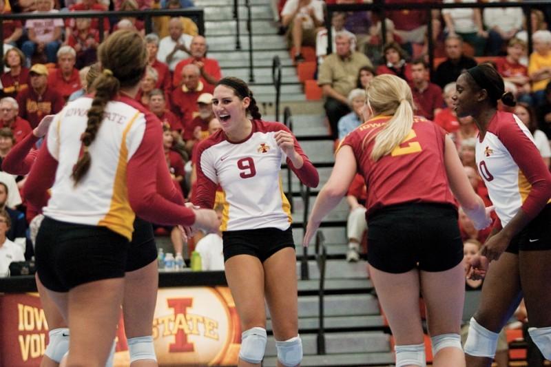 Alison Landwehr celebrates with teammates during a match on Wednesday, Oct. 6 at Ames High.