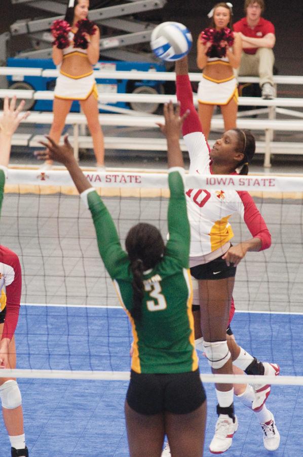 Outside+hitter+Victoria+Henson+jumps+for+a+kill+against+Baylor+on+Wednesday%2C+Nov.+3+at+Ames+High.