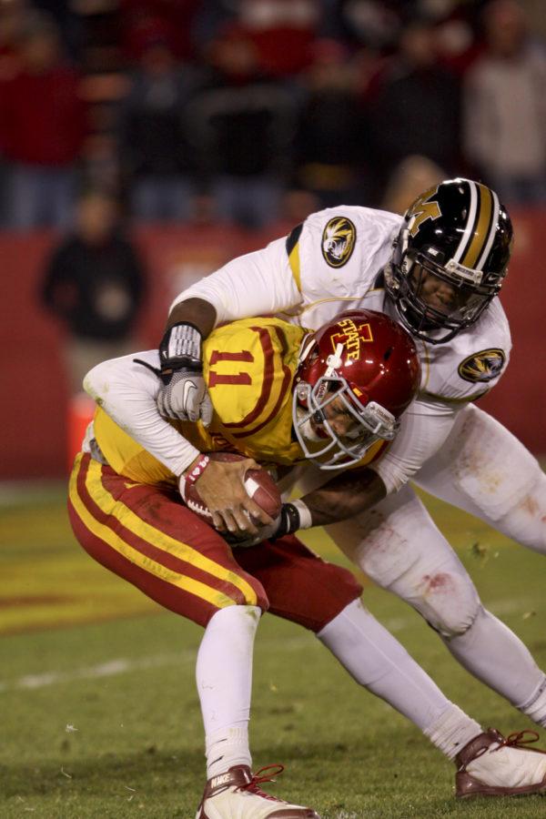 Quarterback Jerome Tiller is taken down by a Missouri opponent during the game Saturday. Missouri defeated Iowa State 14-0.