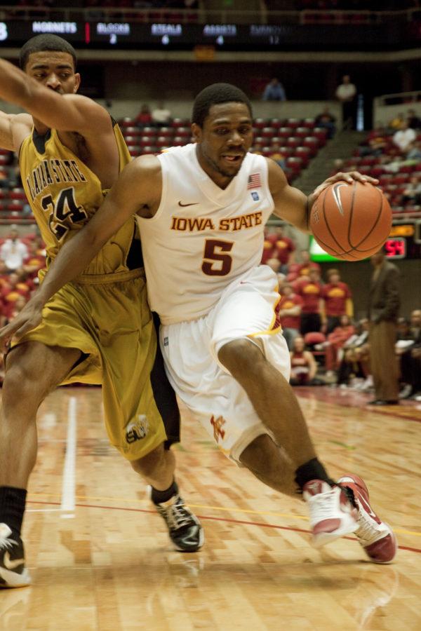 Guard Darion Jake Anderson drives the ball towards the hoop Sunday at Hilton Coliseum.The Cyclones beat the Alabama State Hornets 74-47. 