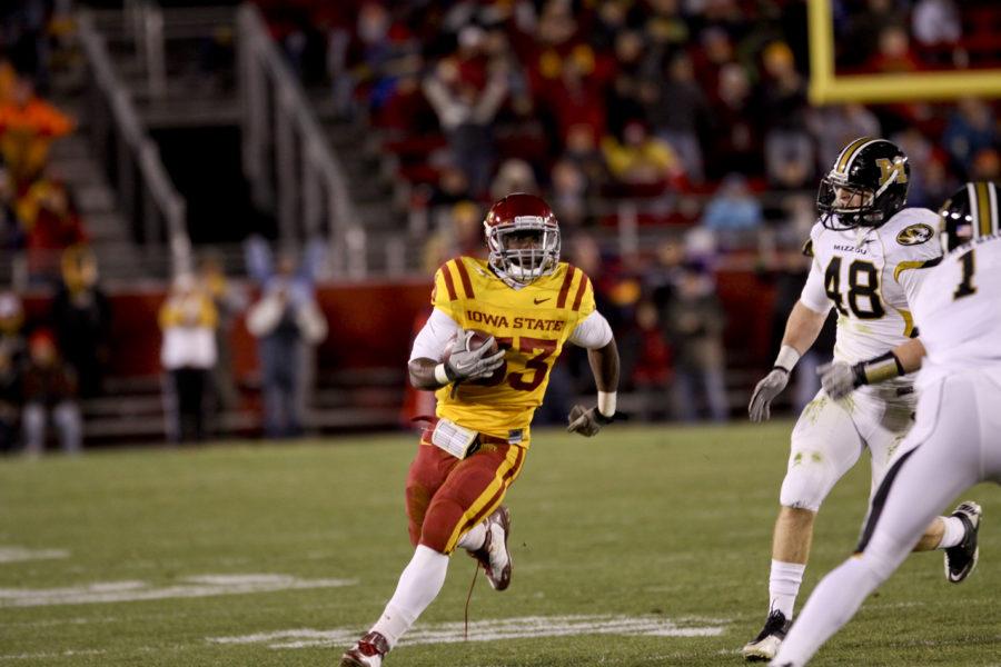 Running back Alexander Robinson rushes the ball down the field during the first half of the game against Missouri. Robinson rushed for a total of 98 yards, and the Cyclones lost to the Tigers 14-0.