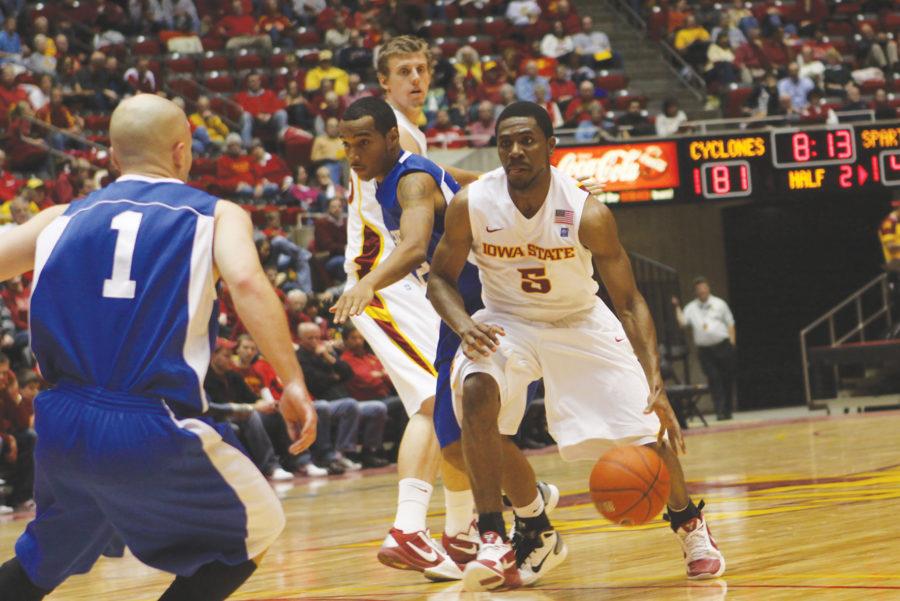 Guard Jake Anderson aims to drive to the basket on Friday at Hilton Coliseum. Iowa State defeated Dubuque 100-50.