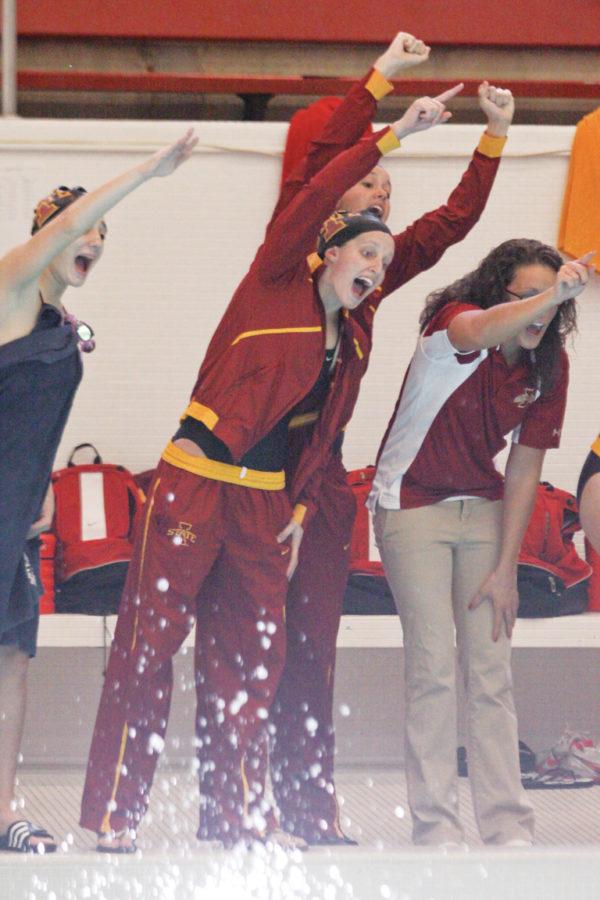 The Iowa State swimming and diving team cheer on their fellow team members during the swim meet on Saturday. Iowa State beat Western Illinois University with a score of 161-48, as well as South Dakota State University with a score of 152-83.