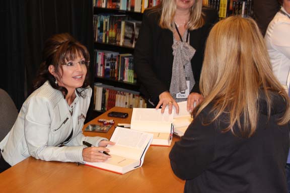 Former Governor of Alaska and 2008 Republican nominee for vice president Sarah Palin beings a book tour by signing copies of her new book, America by Heart: Reflections on Family, Faith and Flag, in Phoenix on Tuesday, Nov. 23.