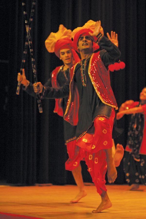 Nishan Singh, sophomore in pre-business, dances in a Punjabi folk dance called Bhangra during Diwali Night, presented by the Indian Students Association, on Saturday in the Great Hall of the Memorial Union. Singh is a member of Iowa States competitive Bhangra Dance team that was formed last spring.